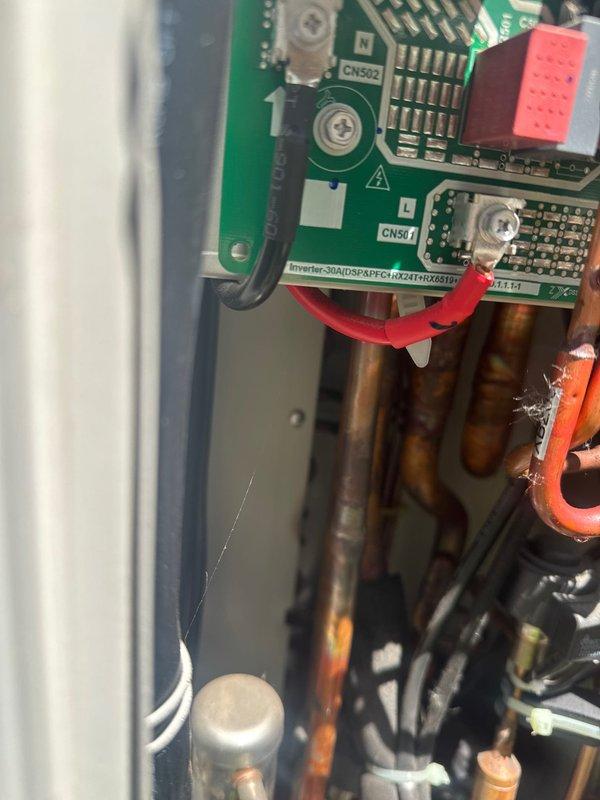 Responded to no cooling complaint on Lennox heat pump system. Upon inspection, discovered burned inverter control board assembly, which was preventing the unit from operating in cooling mode. Documented damaged PCB components and provided estimate for replacement board installation.
