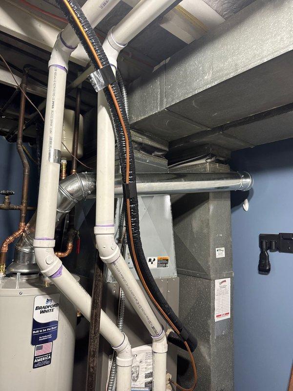 Responded to service call for non-functional and leaking water heater. Removed failed unit and installed new 40-gallon natural gas Bradford White water heater. Connected all water supply lines, gas piping, and venting system to manufacturer specifications. Verified proper operation, checked for leaks, and ensured all safety controls functioning correctly.
