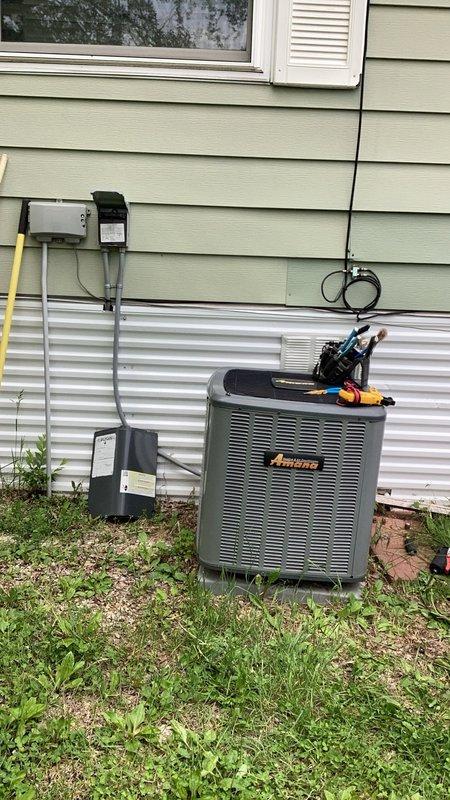 Responded to no cooling complaint on Goodman ASX160903 air conditioning unit at mobile home. Upon arrival, confirmed system was running but compressor was not engaging. Diagnostic testing revealed failed dual run capacitor preventing compressor operation. Removed defective capacitor and installed new replacement capacitor with proper microfarad rating. Verified compressor startup, checked amp draw within manufacturer specifications, and confirmed system cooling properly before departure.