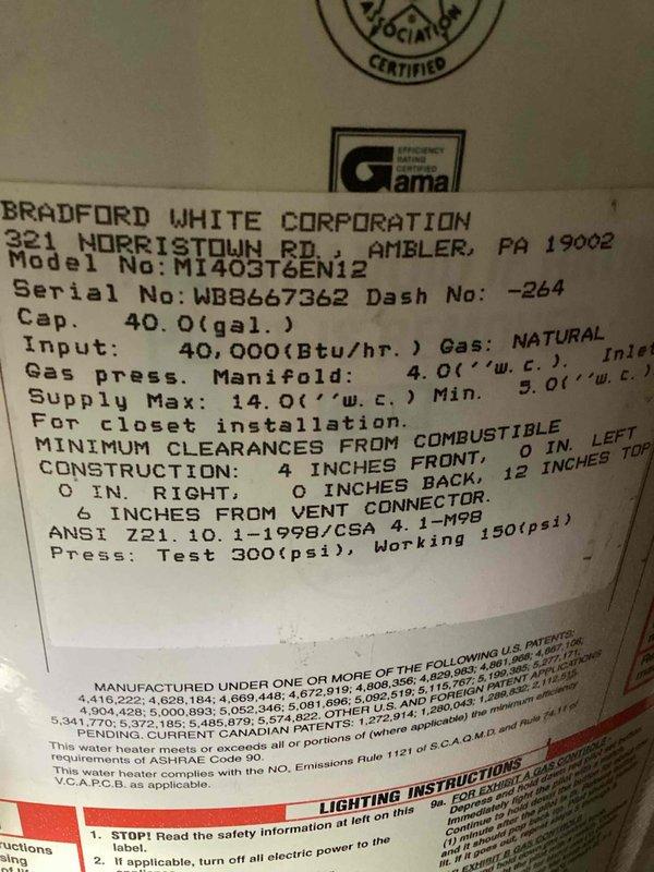 Responded to service call for Bradford White 40-gallon natural gas water heater that would not stay lit. Upon inspection, found burner assembly heavily corroded and contaminated with debris. Removed and thoroughly cleaned burner assembly, then installed new thermocouple. Reassembled unit and attempted to relight pilot, but flame extinguished immediately upon releasing igniter button, indicating failure beyond thermocouple replacement. Due to extent of corrosion and component failure, provided estimate for complete water heater replacement.