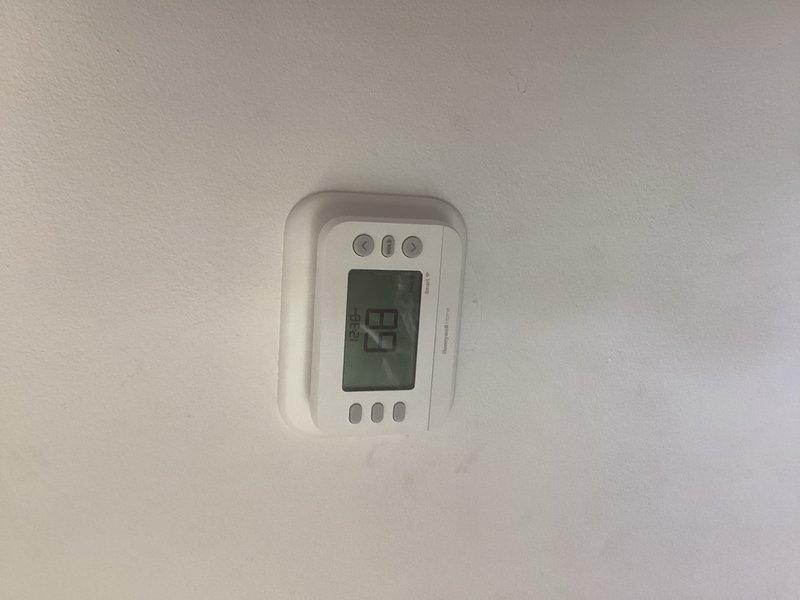 Responded to service call for programmable thermostat installation assistance. Upon arrival, determined existing thermostat wire at furnace was insufficient for proper connection of new Honeywell digital programmable thermostat. Ran new thermostat wire from furnace to wall location and completed installation, ensuring proper communication between thermostat and heating system.