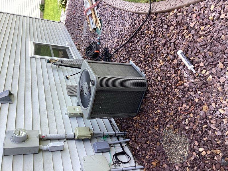 Performed comprehensive one-time air conditioning tune-up and maintenance service on residential outdoor condensing unit. Upon arrival and initial inspection, identified outdoor coil contamination with accumulated dirt and debris restricting airflow through the heat exchanger fins. Thoroughly cleaned outdoor coil to restore proper heat transfer efficiency and system performance. Completed standard preventive maintenance procedures to ensure optimal cooling system operation for the season.