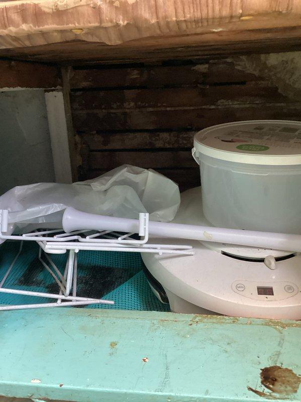 Responded to emergency call for burst pipe causing water intrusion from upper apartment unit into basement area below. Upon inspection, identified kitchen sink drain line leaking at cast iron connection point beneath sink. Attempted initial repair at P-trap and drain connection using standard methods, but leak persisted due to compromised connection integrity. Determined that repair access point needed to be established further downstream along drain line to achieve secure, watertight connection. Due to time constraints and scope of work required, job was rescheduled to allow for proper access and complete repair of drain system.