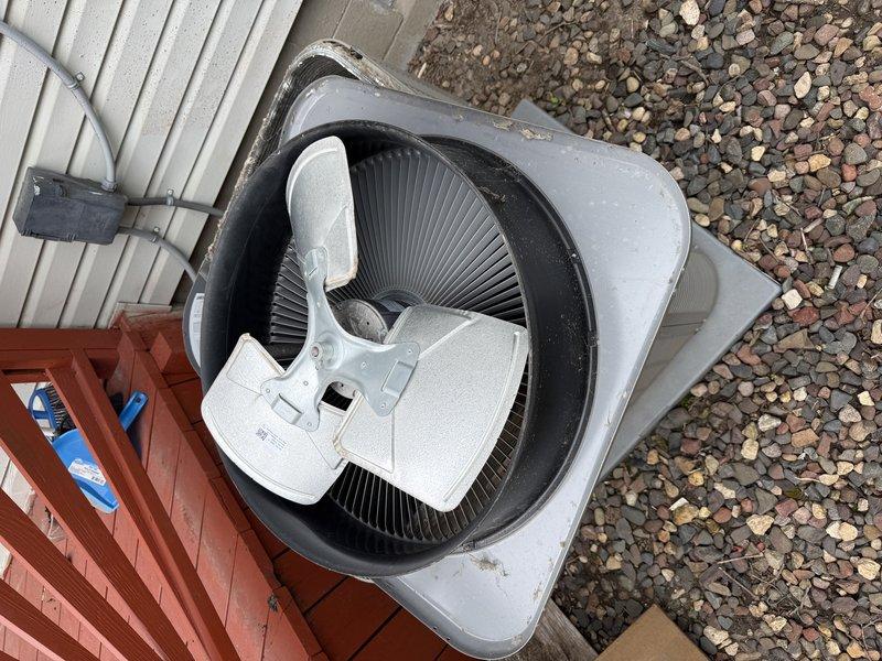 Completed warranty replacement of condenser fan shroud and fan blades on outdoor air conditioning unit. All components were successfully installed and unit was left in proper working condition.