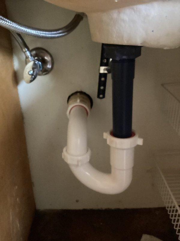Responded to a callback for a leaking bathroom sink. Upon inspection, determined the angle stops were defective and leaking through the packing. Removed the faulty angle stops and installed new angle stops with new supply lines. Restored water supply to the home and verified all connections were secure with no leaks present.