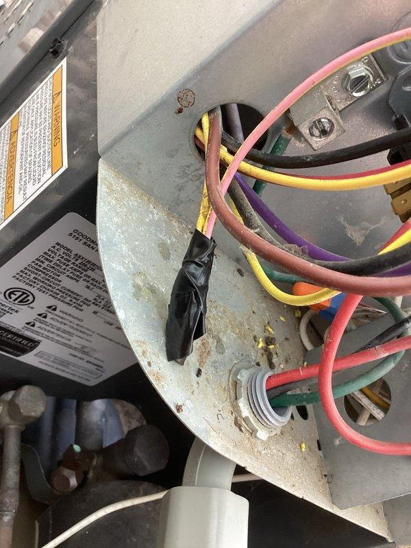 Responded to no cooling call on residential air conditioning system. Upon arrival, confirmed blower motor operating but no cool air delivery throughout home. Diagnostic inspection revealed two critical failures: broken wire connection at pressure switch and failed dual-run capacitor (40+5 MFD, 440/370 VAC). Repaired damaged wire connection to pressure switch, restoring proper safety circuit operation. Replaced defective capacitor with new unit under existing parts warranty. Verified proper electrical connections, tested system operation, and confirmed return to normal cooling function. Unit restored to full operational status.