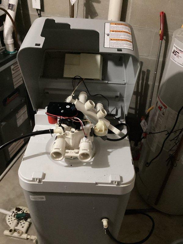 Responded to service call for water softener installation after customer's unsuccessful DIY attempt resulted in leaking. Successfully installed new water softener system with complete plumbing connections, including copper supply lines, shut-off valves, and drain configuration. System tested and confirmed operational with no leaks detected upon completion.