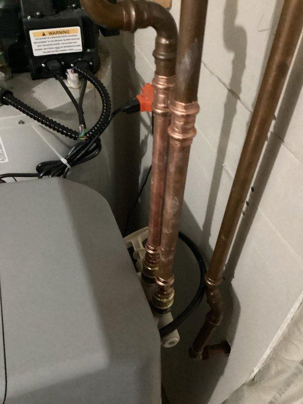 Responded to service call for water softener installation after customer's unsuccessful DIY attempt resulted in leaking. Successfully installed new water softener system with complete plumbing connections, including copper supply lines, shut-off valves, and drain configuration. System tested and confirmed operational with no leaks detected upon completion.