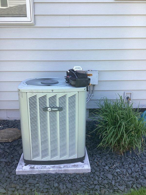 Responded to no-cool call on aging residential AC system. Found blown fuses in outdoor disconnect box, preventing power to condenser unit. Replaced fuses and restored system operation.