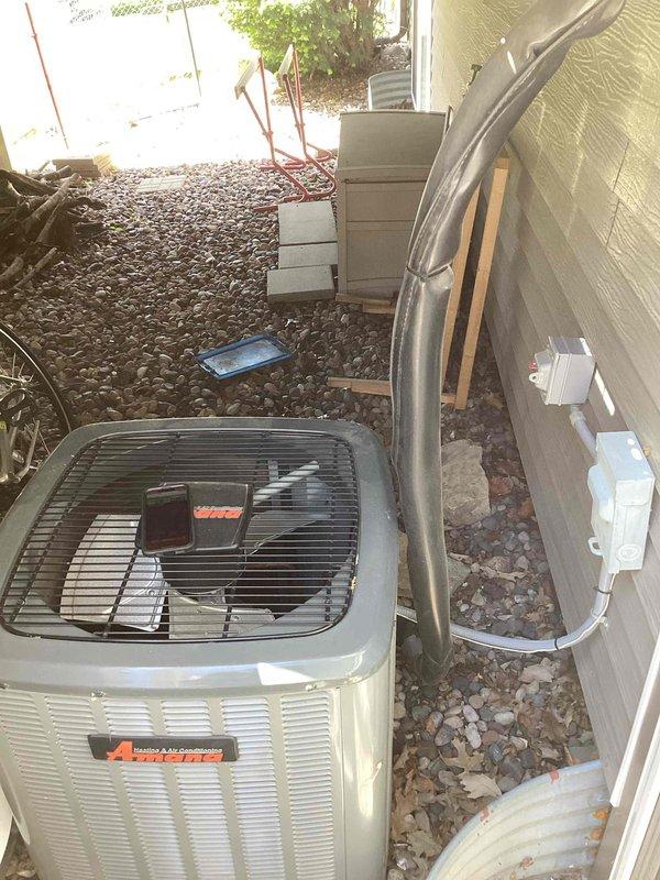 Responded to service call for buzzing noise originating from electrical panel. Upon inspection, discovered incoming neutral wire had melted at connection point where it meets ground lug, creating hazardous condition and audible buzzing. Customer reported similar buzzing noise coming from air conditioning unit. Documented electrical panel condition with photographs. Coordinated HVAC technician dispatch to assess air conditioning system for related electrical issues, as buzzing noise at both panel and AC unit suggested potential shared electrical fault requiring comprehensive evaluation of both systems.