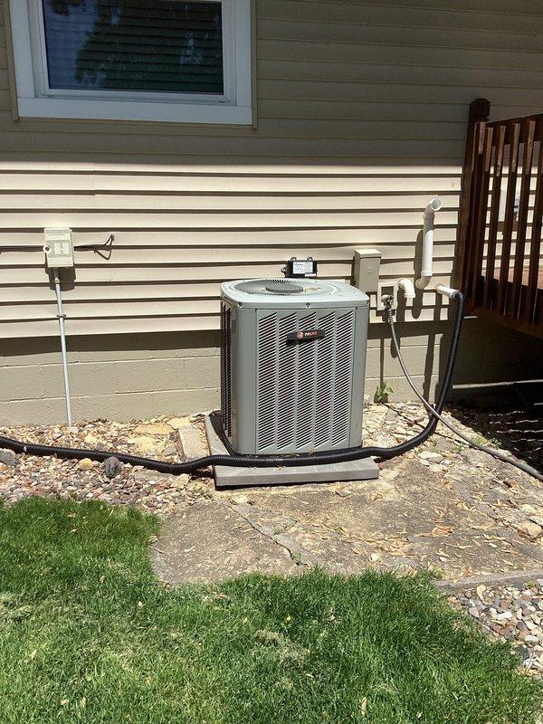 Responded to no cool call on residential Trane air conditioning system. Upon arrival, confirmed unit would not power on. Performed diagnostic testing and identified failed furnace control board preventing system operation. Due to age of equipment (10+ years) and extent of failure, recommended complete system replacement. Customer approved replacement. Documented existing outdoor condensing unit installation and interior furnace cabinet with failed control board through service photographs prior to system changeout.