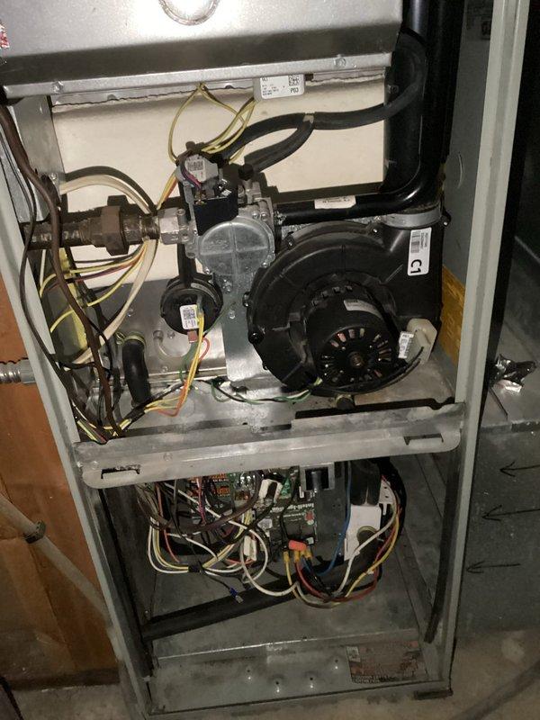 Responded to no cool call on residential Trane air conditioning system. Upon arrival, confirmed unit would not power on. Performed diagnostic testing and identified failed furnace control board preventing system operation. Due to age of equipment (10+ years) and extent of failure, recommended complete system replacement. Customer approved replacement. Documented existing outdoor condensing unit installation and interior furnace cabinet with failed control board through service photographs prior to system changeout.