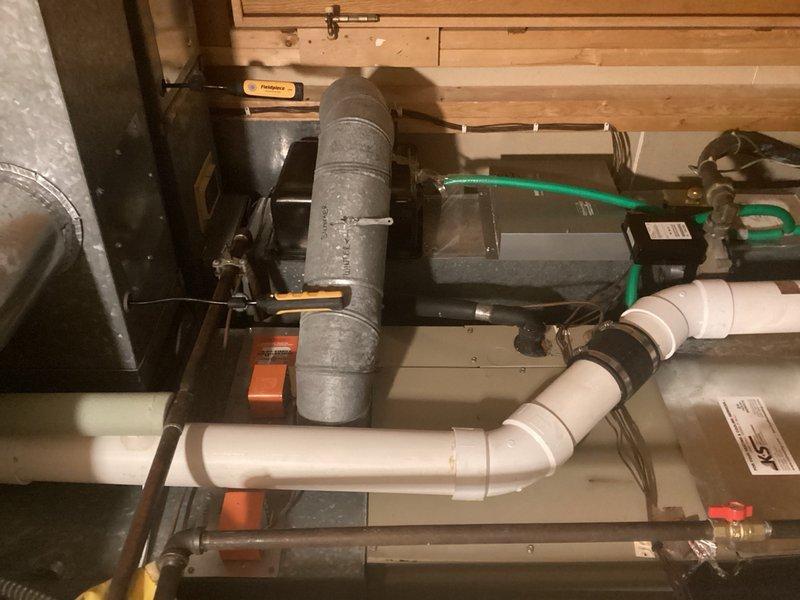 Responded to no cooling complaint on residential HVAC system. Upon diagnosis, determined that the zone panel was not sending proper wire signals to the air handler, preventing the blower fan from ramping up to cooling speed. Implemented temporary solution by installing jumper wire from G terminal to Y terminal at the furnace to restore cooling operation and proper fan speed control. System tested and confirmed operational with adequate airflow for cooling mode.