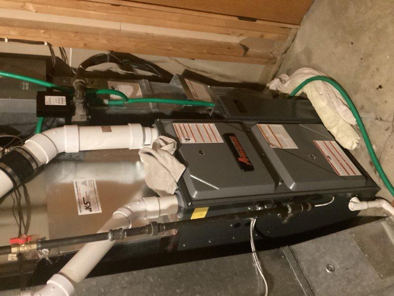 Responded to no cooling complaint on residential HVAC system. Upon diagnosis, determined that the zone panel was not sending proper wire signals to the air handler, preventing the blower fan from ramping up to cooling speed. Implemented temporary solution by installing jumper wire from G terminal to Y terminal at the furnace to restore cooling operation and proper fan speed control. System tested and confirmed operational with adequate airflow for cooling mode.