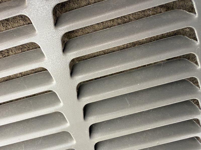Responded to no cooling call on 1-year-old AC unit. Upon inspection, discovered failed capacitor and burned C wire caused by severely clogged condenser coil due to inadequate maintenance. Replaced damaged capacitor and C wiring, thoroughly cleaned clogged coil and entire outdoor unit to restore proper airflow and system operation. Unit tested and confirmed cooling restored to normal parameters.