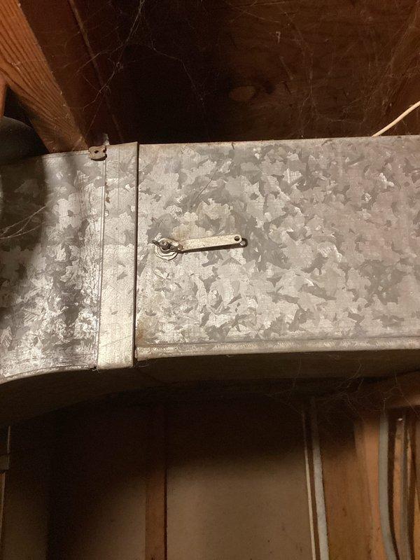 Responded to no cool call and diagnosed inadequate airflow to one room. Upon inspection, located closed damper in ductwork serving affected zone. Opened damper to restore proper airflow distribution. Verified cooling operation restored to room and system functioning normally throughout home.