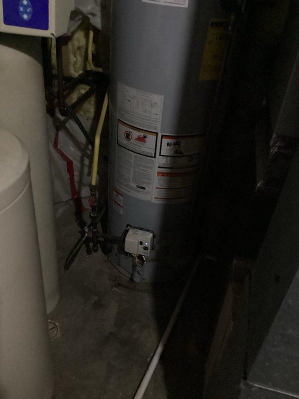 Responded to service call for non-operational tanked water heater. Upon arrival, diagnosed vapor sensor lockout condition preventing unit from firing. Successfully reset vapor sensor and restored water heater to normal operation. Unit tested and confirmed functioning properly at time of departure.