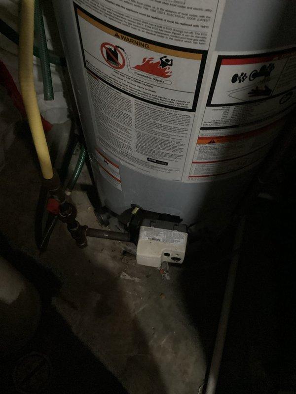 Responded to service call for non-operational tanked water heater. Upon arrival, diagnosed vapor sensor lockout condition preventing unit from firing. Successfully reset vapor sensor and restored water heater to normal operation. Unit tested and confirmed functioning properly at time of departure.