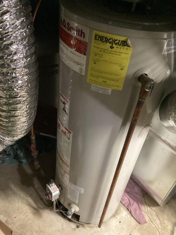 Responded to service call for leaking water heater. Upon arrival, confirmed active leak from tanked water heater unit. Removed and replaced failed water heater with new A.O. Smith unit, reconnected copper supply lines and plumbing connections, verified proper installation and operation, and ensured all connections were secure with no leaks detected.