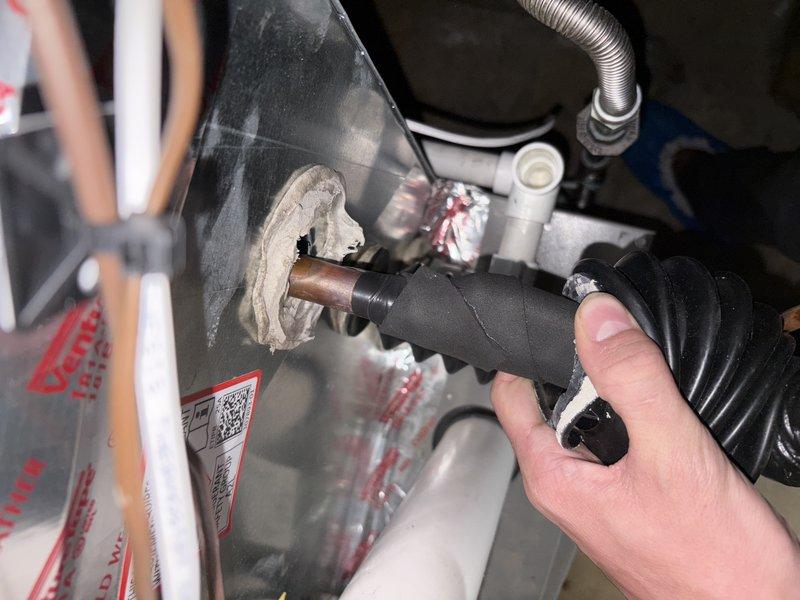 Responded to no-cooling complaint on 10-month-old Lennox ML13KC1-024 system where indoor temperature reached 81°F despite thermostat set to 78°F. Found tripped breaker upon arrival, reset breaker and restored power to system. Performed comprehensive system inspection and noted significant corrosion buildup on copper refrigerant line connection, indicating potential moisture intrusion or installation-related issue. Verified system operation, confirmed proper airflow through outdoor unit louvers, and documented R-454B refrigerant specifications matching factory charge of 4 lbs 7 oz. System restored to normal cooling operation.