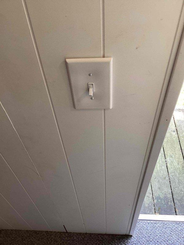 Responded to service call for non-functional porch light fixture. Upon arrival, verified power present at wall switch but no power reaching the exterior lantern-style light fixture. Diagnosed issue as failed dawn-to-dusk photocell sensor preventing proper operation. Explained sensor function and failure mode to homeowner, demonstrating how the photocell controls power to the fixture based on ambient light levels.