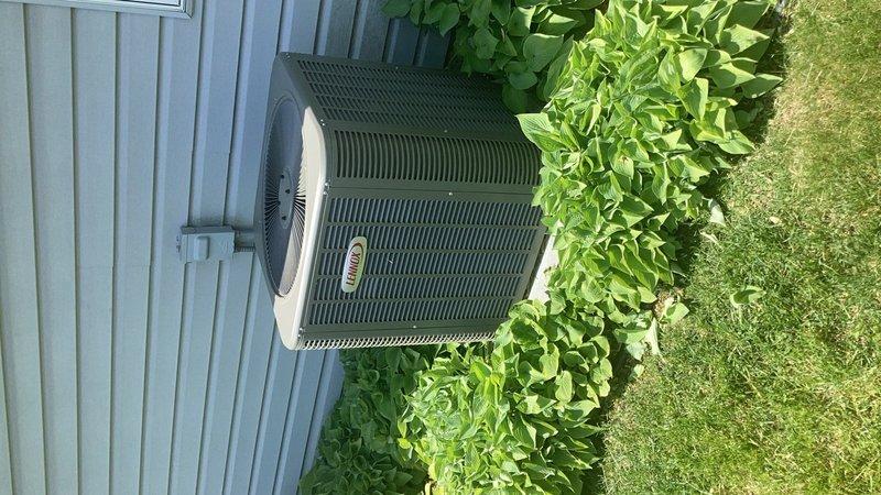 Responded to service call for loud noise complaint on residential AC system. Upon arrival, confirmed unit was maintaining cooling capacity despite audible noise issue. Conducted diagnostic inspection of outdoor condenser unit and surrounding components. Identified source of noise as harmonic vibrations occurring in the refrigerant line set. Documented equipment condition and installation with photographs showing condenser unit positioned on concrete pad with adequate clearance from landscaping. Provided customer with detailed estimate for necessary repairs to eliminate vibration issue and restore quiet operation.