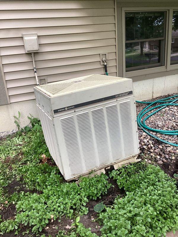 Responded to no cooling call on General Electric air conditioning system. Upon arrival, confirmed thermostat was calling for cooling but outdoor condensing unit was not operating. Performed diagnostic evaluation and determined system was critically low on refrigerant charge. Given the age of the unit (10+ years old), extent of refrigerant loss, and overall condition of the equipment, recommended full system replacement rather than repair. Customer approved replacement of aging AC unit.