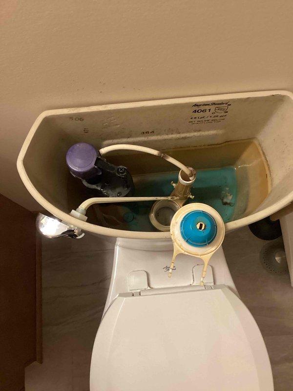 Responded to service call for malfunctioning toilet in downstairs hallway. Upon inspection, identified defective fill valve and flapper as primary issues causing improper operation and leaking. Removed and replaced both components with new parts. Conducted multiple flush tests to verify proper operation and confirm no further leaking or mechanical problems. System restored to full working condition.