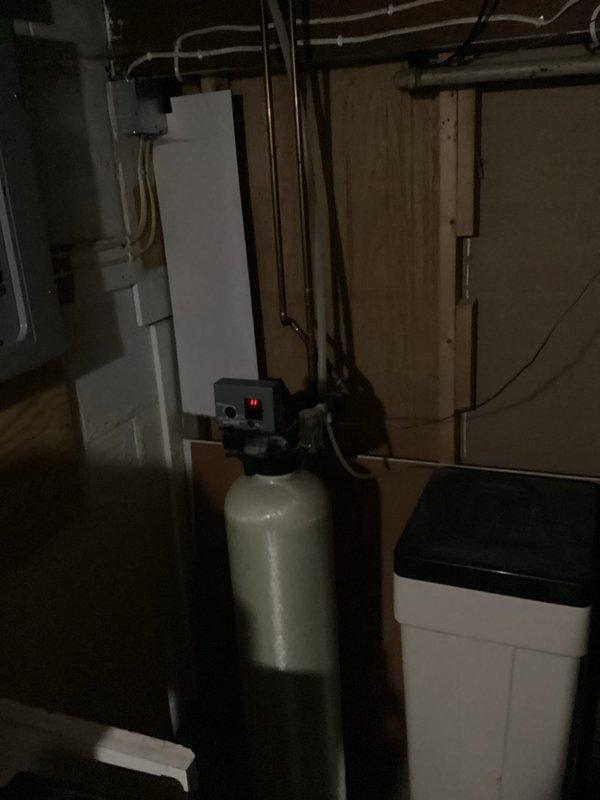 Responded to service call for non-functional water softener system. Upon inspection, determined the existing water softener unit had failed and was beyond economical repair. Removed the old water softener equipment and installed a new replacement unit in the basement utility area. Connected the new system to existing copper supply lines and configured the control valve with appropriate settings. Tested the new water softener for proper operation, verified all plumbing connections for leaks, and confirmed adequate water flow and pressure throughout the system. Customer was provided with maintenance recommendations and operating instructions for the new equipment.