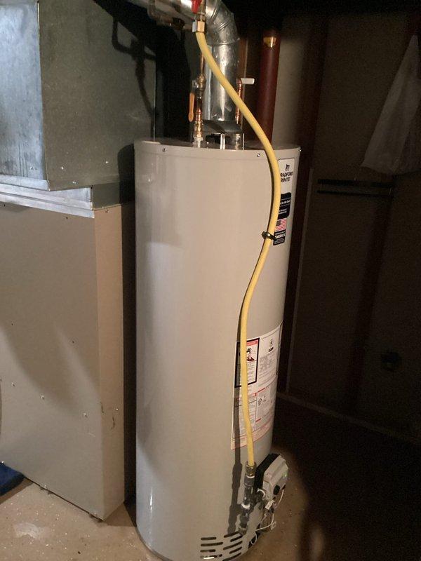 Responded to service call for non-functioning water heater and successfully completed full unit replacement. Removed existing failed water heater and installed new A.O. Smith ProMax tanked water heater in basement utility room. Connected all required plumbing lines including hot and cold water supply, installed temperature and pressure relief valve with proper discharge piping, and reconnected gas supply line with appropriate flexible connector. Verified all connections for proper operation and tested unit for safe functionality.