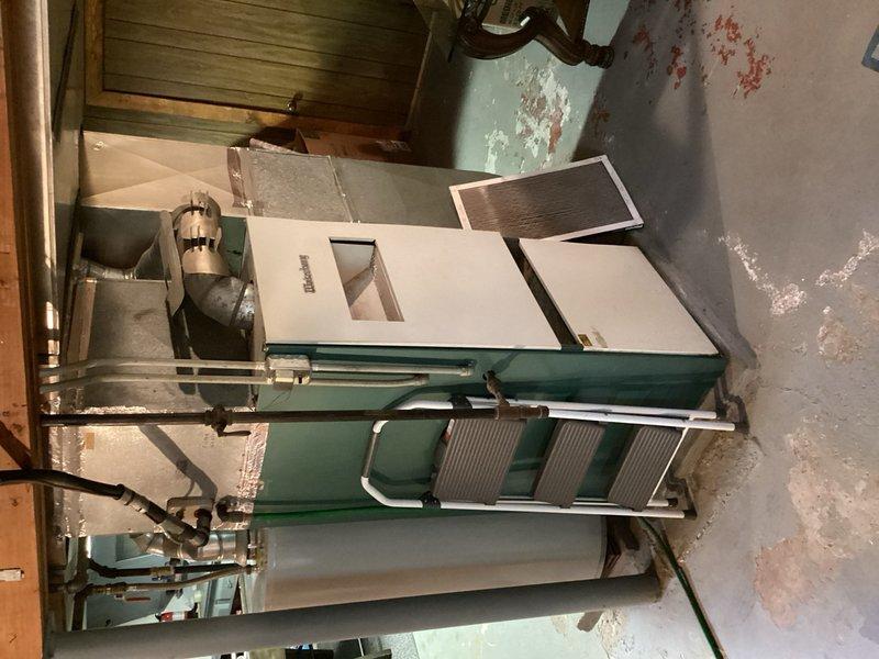 Responded to no cooling complaint on aging York AC system. Upon arrival, found evidence of previous ice buildup on evaporator coil and confirmed unit was low on R-22 refrigerant. Performed system diagnostics and pressure testing to verify refrigerant loss. Given the system's age (10+ years), deteriorated condition of both the air handler and outdoor condensing unit, obsolete R-22 refrigerant requirements, and overall wear evident throughout the equipment, recommended full system replacement rather than repair. Discussed replacement options with property owner due to diminishing availability and increasing cost of R-22 refrigerant, as well as the likelihood of additional component failures in the near future.