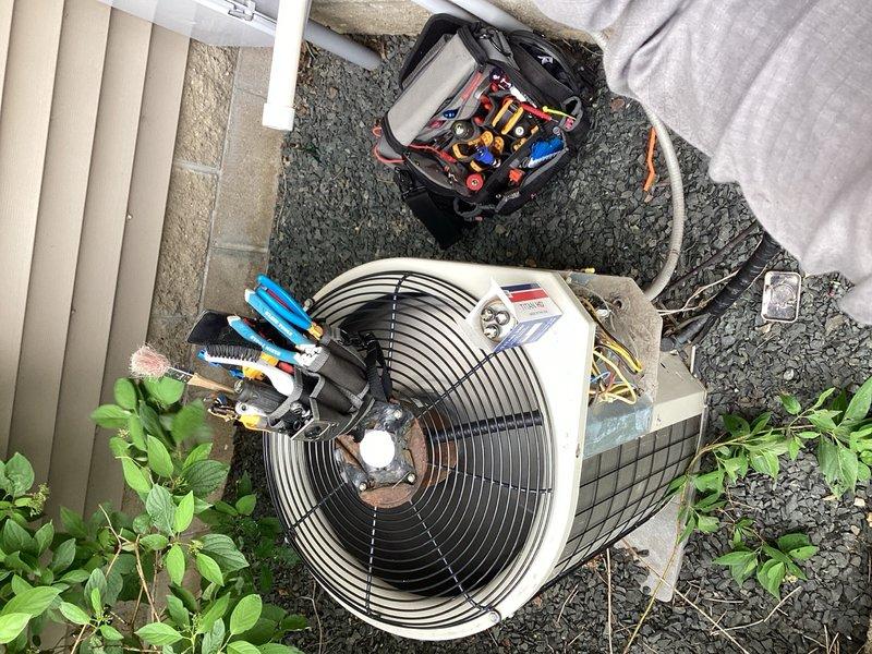 # HVAC Service Call - No Cooling Condition

Responded to a no cooling complaint affecting the entire residence. Upon arrival, confirmed the air conditioning system was blowing warm air with no temperature reduction. The unit, a twenty-year-old outdoor condensing unit, required immediate diagnostic evaluation.

## Diagnostic Findings

Performed comprehensive system inspection of the outdoor condenser unit. Identified a failed run capacitor as the root cause of the no cooling condition. The capacitor showed signs of electrical failure, preventing the compressor and condenser fan motor from operating properly. This component failure is common in aging HVAC systems, particularly those approaching or exceeding their expected service life.

## Repairs Completed

Replaced the defective capacitor with a new TITAN HD rated component, ensuring proper electrical specifications matched manufacturer requirements. Verified proper electrical connections and secure mounting of the new capacitor. Start