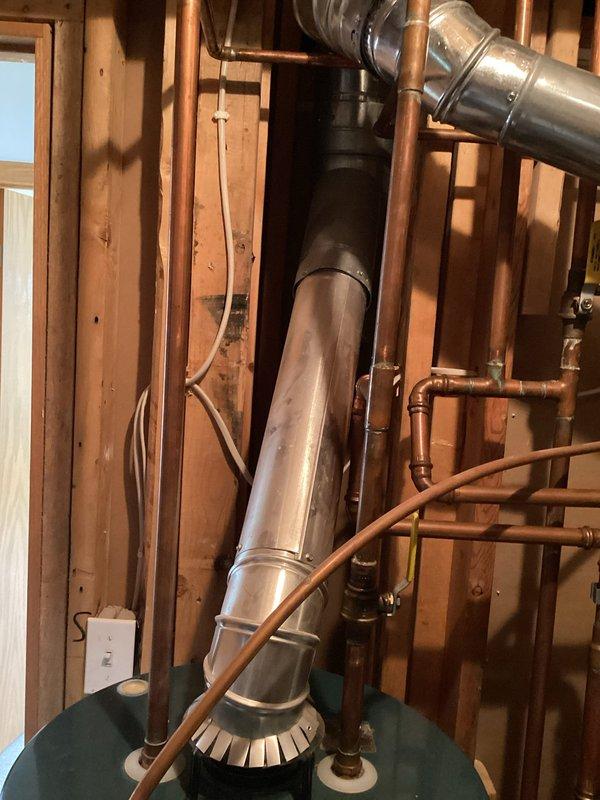 Responded to customer concern regarding water discoloration from tanked water heater system. Conducted comprehensive inspection of the water heater unit, including examination of tank condition, inlet and outlet connections, pressure relief valve, and all associated copper plumbing lines. Inspected for sediment buildup, corrosion, and potential contamination sources. After thorough evaluation, determined that the water heater and all connected components were functioning properly with no defects or issues identified that would cause water discoloration.