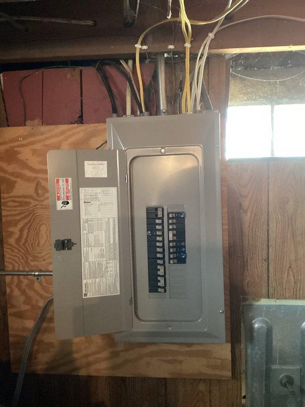 Installed a dedicated 20-amp circuit for an over-the-range microwave outlet in the kitchen. Accessed the electrical panel from an unfinished laundry/utility area and ran new wiring through the wall cavity to the location above the stove, terminating in a code-compliant receptacle for the microwave installation.