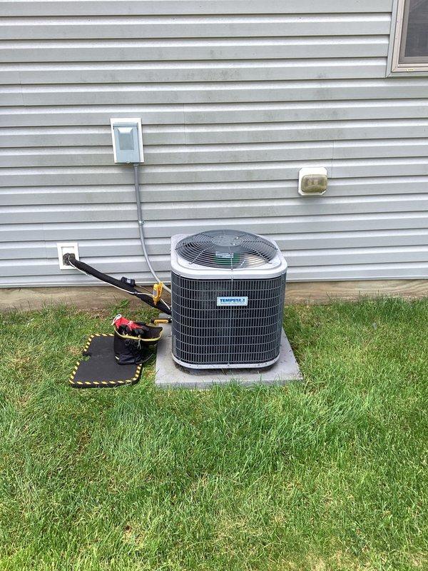 Responded to no cooling call with indoor temperature at 82 degrees. Diagnosed failed condenser fan motor preventing proper heat rejection from the outdoor unit. Removed top panel, disconnected electrical connections, and replaced defective condenser fan motor with new unit. Verified proper motor operation, secure wiring connections, and restored system to normal cooling operation.