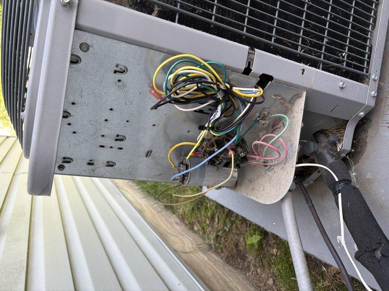 Responded to no cooling call with indoor temperature at 82 degrees. Diagnosed failed condenser fan motor preventing proper heat rejection from the outdoor unit. Removed top panel, disconnected electrical connections, and replaced defective condenser fan motor with new unit. Verified proper motor operation, secure wiring connections, and restored system to normal cooling operation.