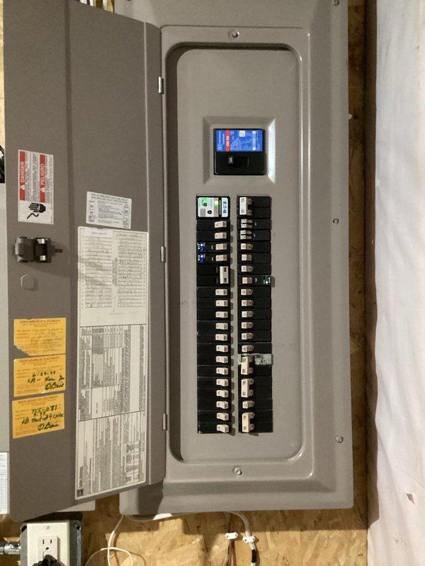 Responded to multiple circuit breaker tripping issues affecting refrigerator, dishwasher, and garage door circuits. Upon inspection, discovered refrigerator drawing 12.5 amps on an undersized 15-amp breaker, dishwasher sharing circuit with wine fridge causing overload, and loose connections at theater projector outlet. Corrected faulty connections at projector outlet and relocated wine cooler to existing dedicated outlet under sink to resolve circuit overload conditions.