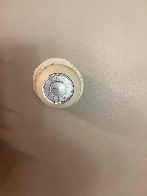Responded to service call and swapped thermostat locations between upstairs and downstairs units per customer request. Successfully relocated both thermostats to their new positions and verified proper operation of both units.