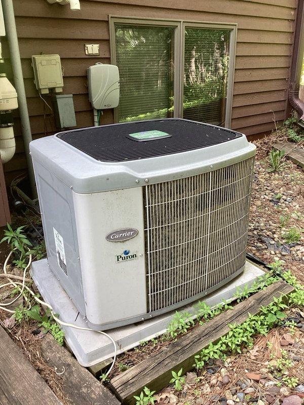 Responded to no cooling complaint on Carrier air conditioning system. Upon arrival, found outdoor condenser unit not starting automatically while indoor blower operated normally. Customer reported manually pressing contactor would start unit, and contactor had been recently replaced. Diagnosed faulty pressure switches preventing proper system operation. Bypassed defective pressure switches to restore cooling functionality. System tested and confirmed operational after repair.