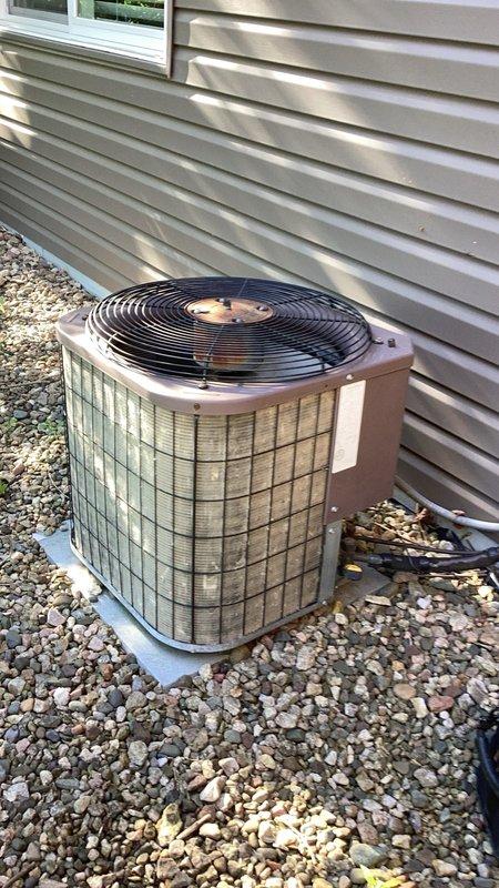 Responded to no cooling complaint on residential air conditioning system. Upon arrival, performed diagnostic evaluation and confirmed system was low on refrigerant. Inspected outdoor condenser unit and documented equipment condition with photos. Advised customer of findings and scheduled follow-up estimate for refrigerant leak detection and repair.