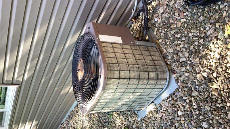 Responded to no cooling complaint on residential air conditioning system. Upon arrival, performed diagnostic evaluation and confirmed system was low on refrigerant. Inspected outdoor condenser unit and documented equipment condition with photos. Advised customer of findings and scheduled follow-up estimate for refrigerant leak detection and repair.