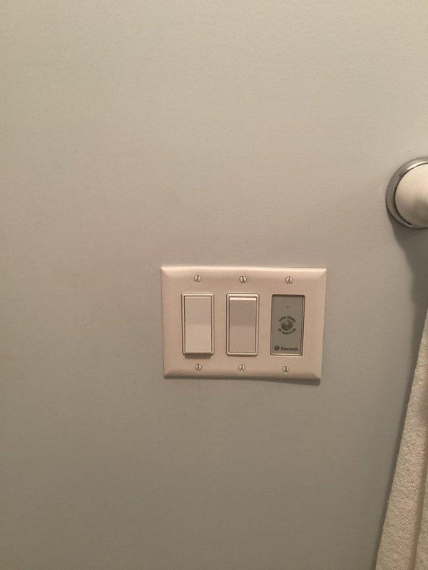 Completed comprehensive electrical inspection of residential property for FRM compliance. Inspected basement mechanical room electrical connections serving HVAC system, furnace, and water heater, verifying proper grounding and circuit protection. Evaluated main floor electrical installations including triple-gang switch configuration with integrated programmable thermostat control. All electrical systems, wiring, and components found to meet current code requirements with no deficiencies identified.
