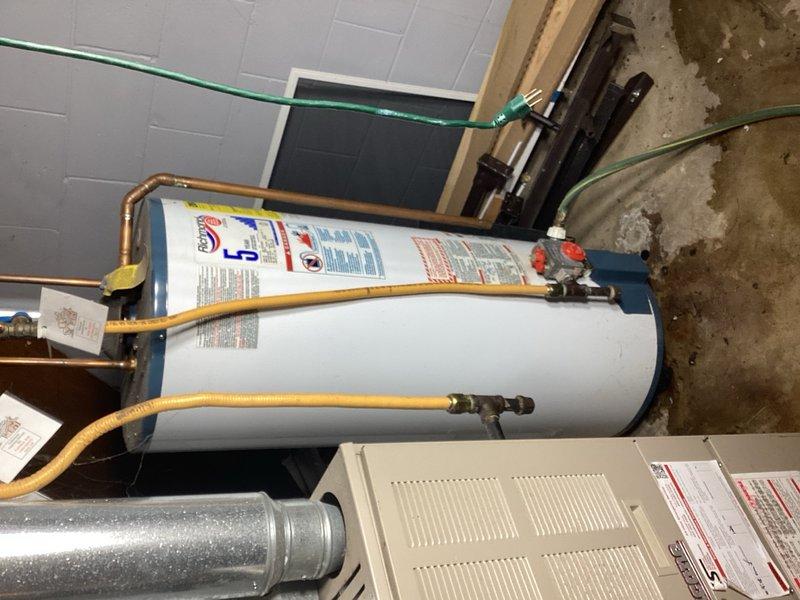 Responded to no cooling complaint on air conditioning system. Upon arrival, found tripped breaker at electrical panel. Reset breaker and verified system operation - air handler running properly with adequate airflow, condenser unit operating within normal parameters. Conducted system diagnostics and found no electrical faults or operational issues causing the breaker trip. System restored to normal cooling operation.

During inspection of mechanical room, observed active water leak from storage tank on gas water heater. Documented condition with photographs and provided estimate for water heater replacement due to tank failure.