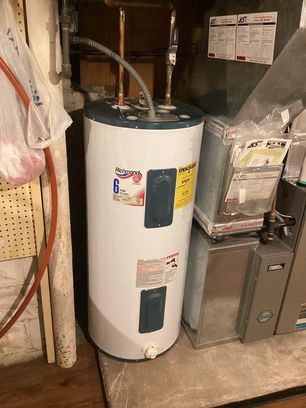 Responded to service call for water heater replacement. Successfully installed customer-supplied Richmond brand tanked water heater in basement utility room. Connected copper supply lines to unit, ensuring proper integration with existing plumbing infrastructure and secure fittings. Verified all connections for leaks, confirmed proper operation, and removed old unit from premises.