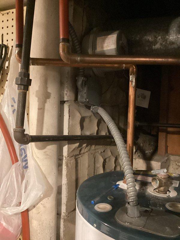 Responded to service call for water heater replacement. Successfully installed customer-supplied Richmond brand tanked water heater in basement utility room. Connected copper supply lines to unit, ensuring proper integration with existing plumbing infrastructure and secure fittings. Verified all connections for leaks, confirmed proper operation, and removed old unit from premises.