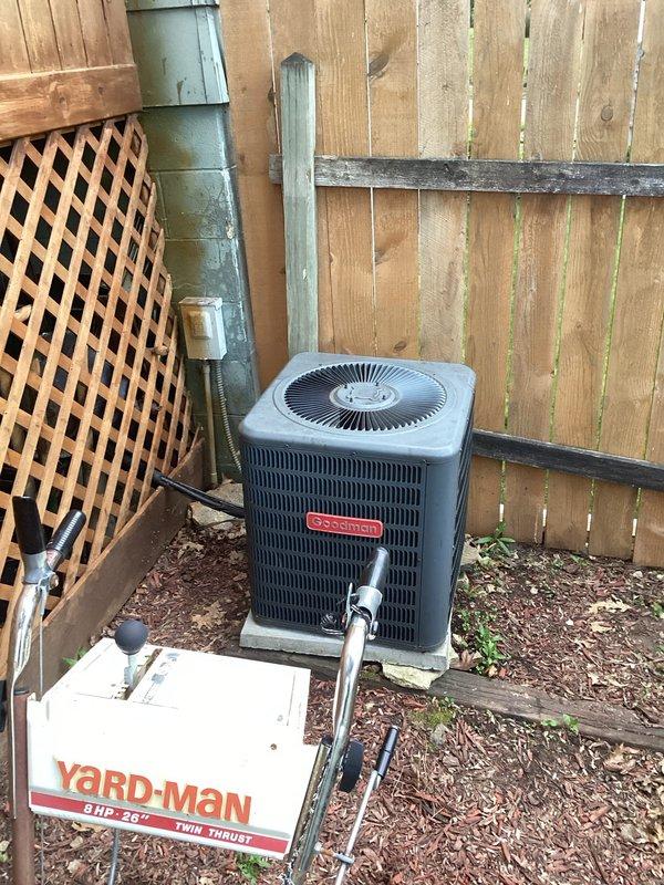 Responded to service call for seven-year-old Goodman air conditioning system experiencing intermittent circuit breaker tripping. Upon arrival, performed diagnostic testing on the condenser unit and electrical components. Attempted to replicate the tripping condition through multiple system cycles but was unable to reproduce the fault during service visit. Inspected electrical panel wiring and connections for signs of overheating, loose connections, or component failure. All visible wiring and terminals showed normal wear consistent with system age. To address potential starting current issues that could cause intermittent breaker trips, installed a hard start capacitor kit on the compressor. This component reduces inrush current during compressor startup, which is a common cause of nuisance tripping in aging systems. Verified proper electrical connections, secured all panel covers, and cycled system multiple times to confirm stable operation. System operated normally throughout testing