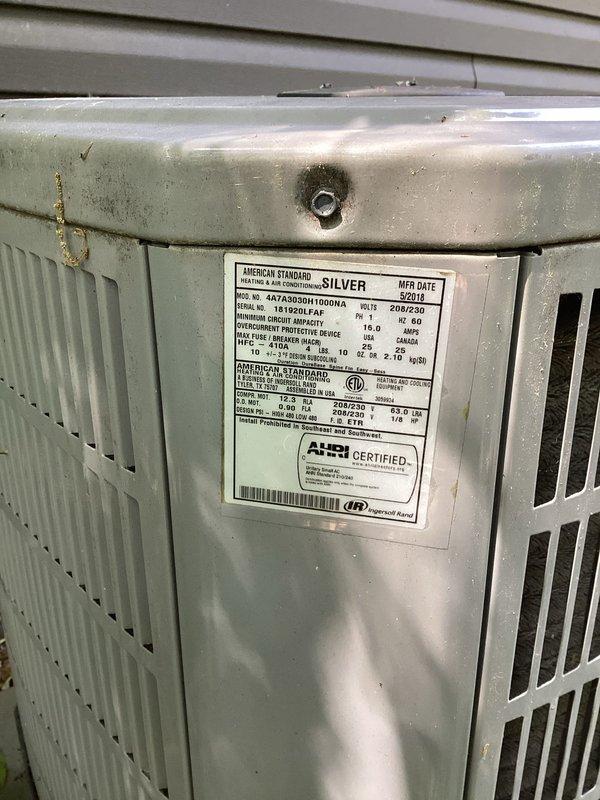 Responded to service call for American Standard air conditioning system experiencing loud hammering noise at condenser unit. Upon arrival, observed system cycling on and off intermittently. Diagnostic testing revealed unit was cutting out on low pressure switch and restarting once refrigerant pressure recovered, indicating active refrigerant leak in system. Given the age of the equipment (manufactured 2019) and severity of refrigerant loss, recommended customer consider system replacement versus leak detection and repair with refrigerant recharge. Customer advised of options and associated considerations for each approach.