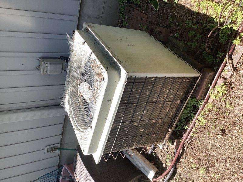 Responded to no cooling complaint on aging outdoor condensing unit. Upon arrival, diagnosed failed compressor causing circuit breaker to trip repeatedly. Unit showed significant age-related wear and deterioration. Provided estimate for compressor replacement and discussed repair options with property owner.