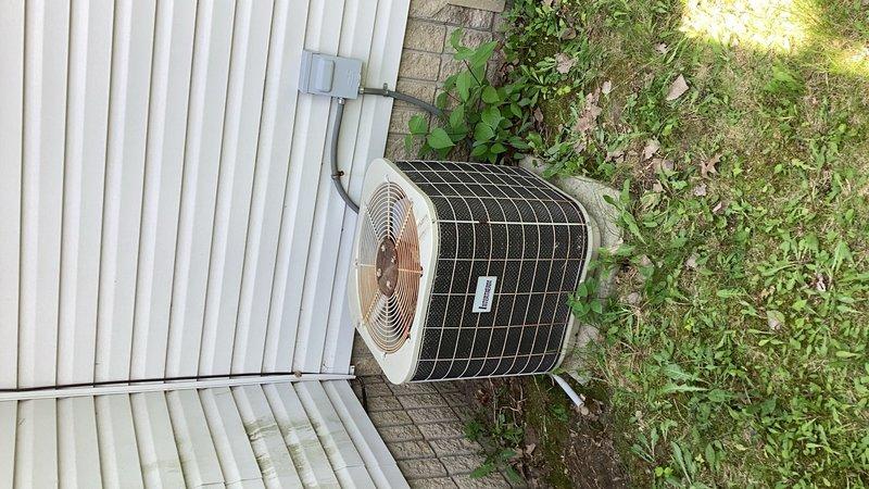 Responded to no cooling complaint at mobile home location. Upon arrival, confirmed air conditioning system was completely inoperative. Performed diagnostic evaluation and traced issue to failed circuit breaker in main electrical panel serving the outdoor condensing unit. Breaker would not reset and showed signs of failure. Advised customer that electrical repairs fall outside scope of HVAC service and recommended scheduling licensed electrician to replace defective breaker before system can be restored to operation.