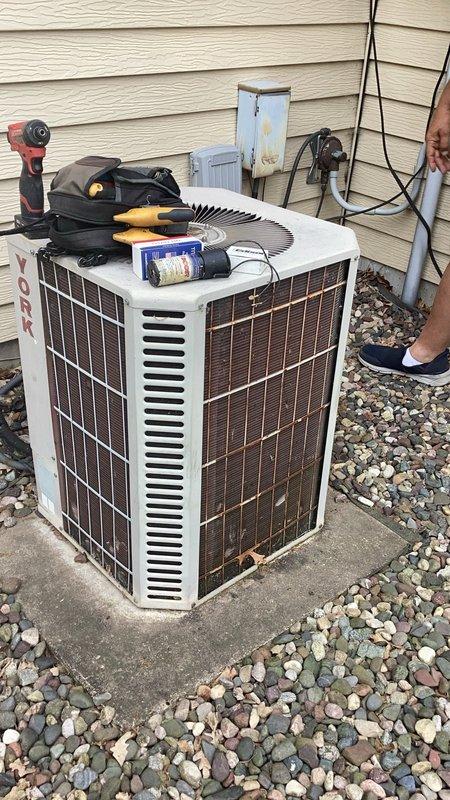 Responded to no cooling complaint on residential air conditioning system. Upon diagnosis, found compressor failing to engage due to failed run capacitor and start capacitor. Replaced both capacitors, restoring proper compressor operation and cooling functionality to the system.